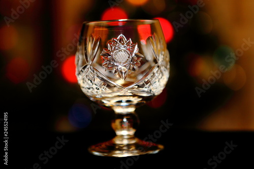 Glass on the background of colored lights