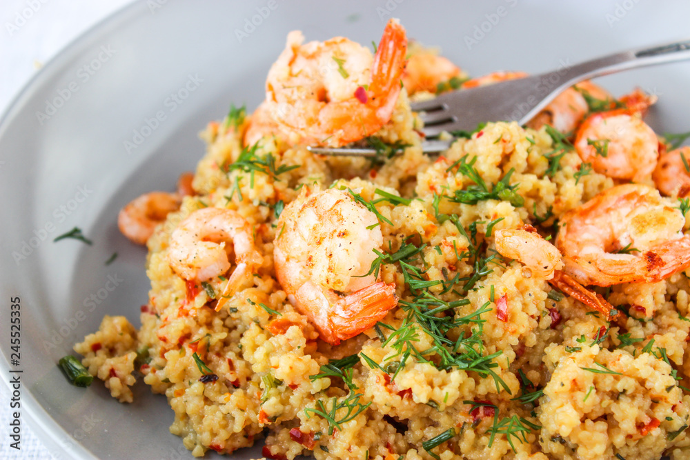 Grits cous cous with vegetables and grilled shrimp Grits cous cous with vegetables and grilled shrimp