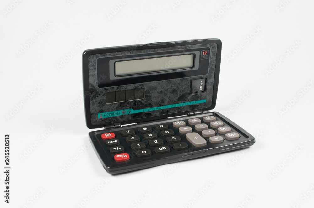 An ordinary calculator with numbers on a white background An ordinary calculator with numbers on a white background