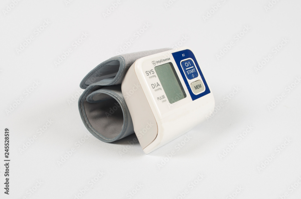 A device for measuring blood pressure and heart rate on a white background A device for measuring blood pressure and heart rate on a white background