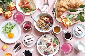 
    Brunch. Festive family breakfast set for Valentines day, Mothers day or Easter. Pink background