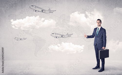 Businessman hitchhiking with flying airplanes cloud and map concept
 photo