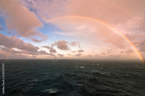 rainbow in the middle of the sea © criskorah