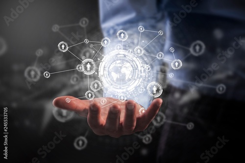 Businessman holding social media network icons structure