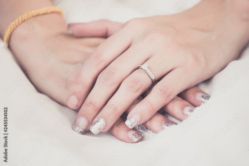 Hands of the bride