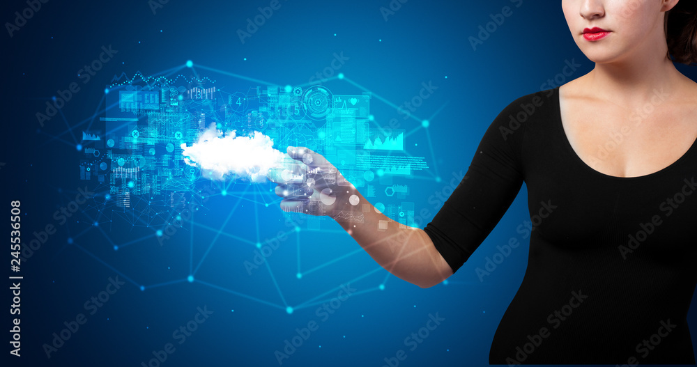 Woman touching hologram projection displaying information from cloud based system
 - obrazy, fototapety, plakaty 