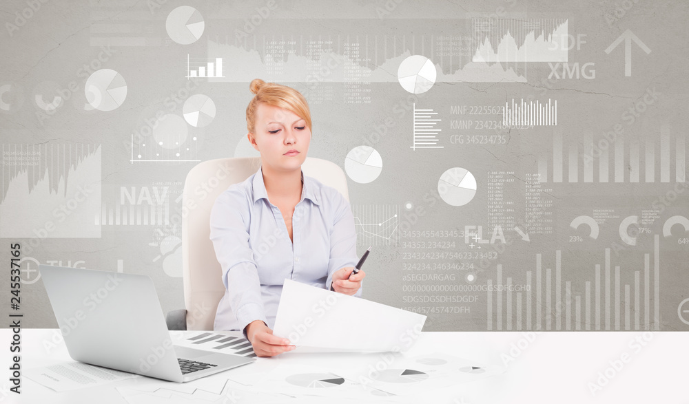 Business person sitting at desk with financial change, and report diagram concept

