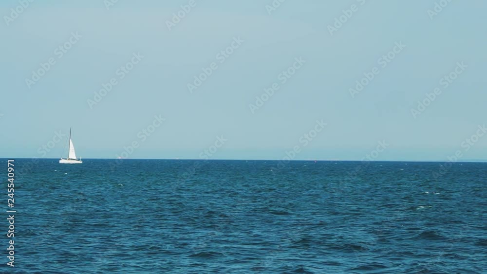 Yacht sailing on opened sea. Boat sailing in Sea. Horizon of the sea. Yacht sailing on opened sea. Boat sailing in Sea. Horizon of the sea.