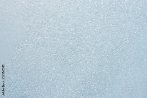 Beautiful winter ice, art texture on window, festive background