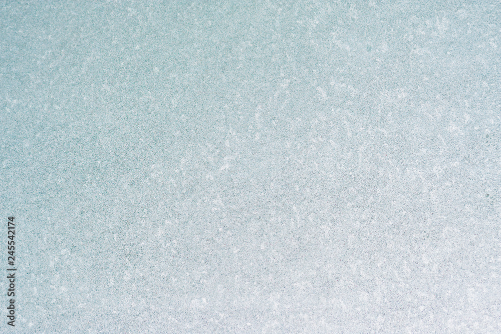 Frozen winter abstract background on the window glass with copy space Frozen winter abstract background on the window glass with copy space