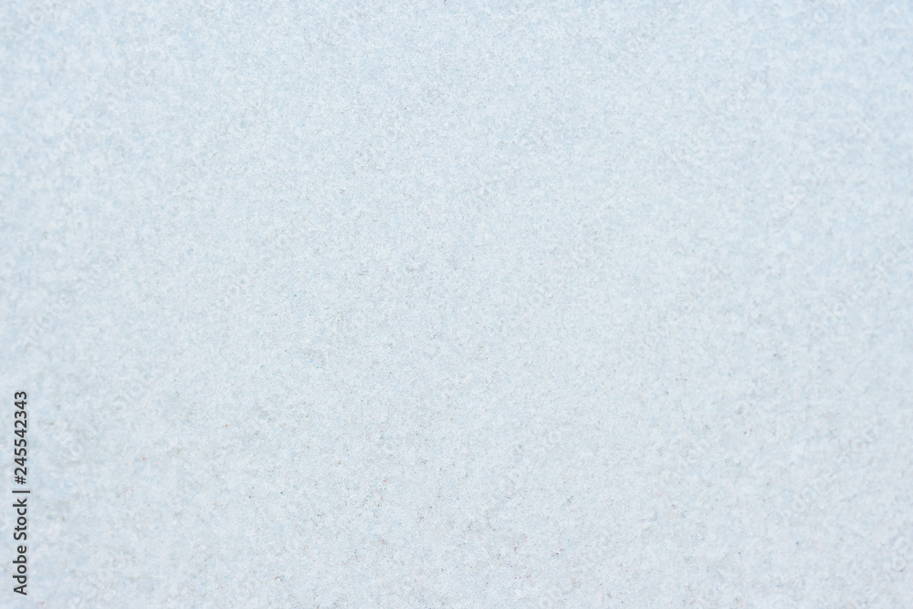 Fototapeta premium Frozen winter abstract background on the window glass with copy space