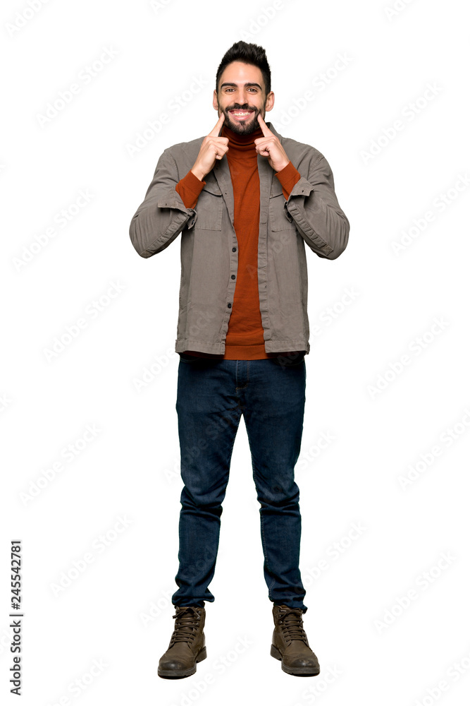 Full-length shot of Handsome man with beard smiling with a happy and pleasant expression on isolated white background Full-length shot of Handsome man with beard smiling with a happy and pleasant expression on isolated white background