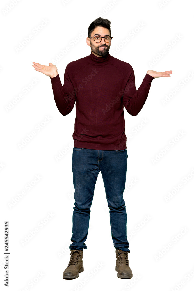 Full-length shot of Handsome man with glasses having doubts while raising hands and shoulders on isolated white background Full-length shot of Handsome man with glasses having doubts while raising hands and shoulders on isolated white background