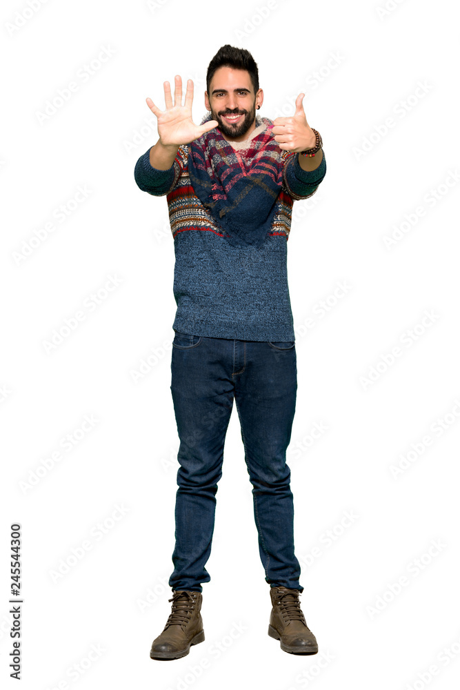 Full-length shot of Hippie man counting six with fingers on isolated white background Full-length shot of Hippie man counting six with fingers on isolated white background