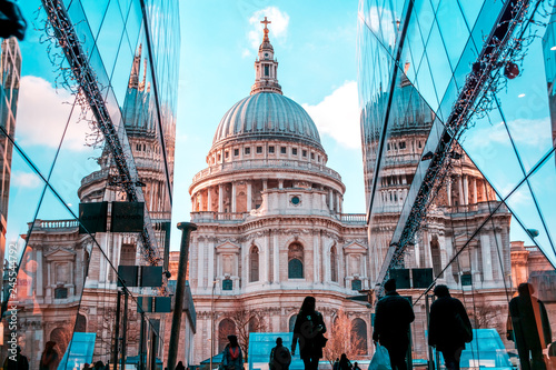 Saint Pauls cathedral in London reflecting in the shopping mall nearby photo