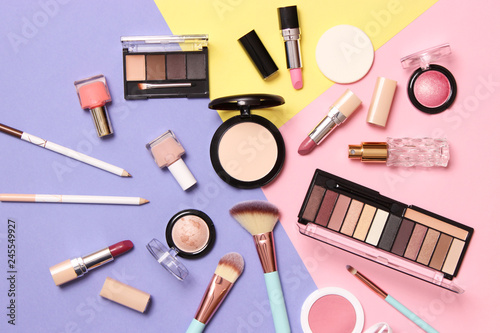 professional makeup tools. Makeup products on a colored background top view. A set of various products for makeup.