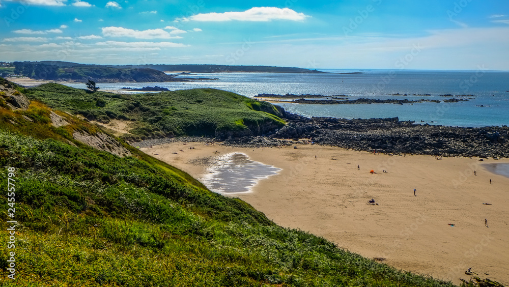 View of the coast in sunshine in Brittany at Cape Frehel in France