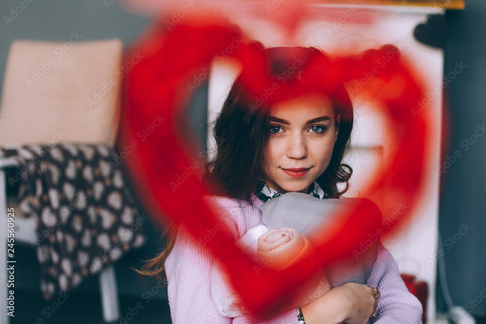 Naklejka premium Girl in heart closeup
