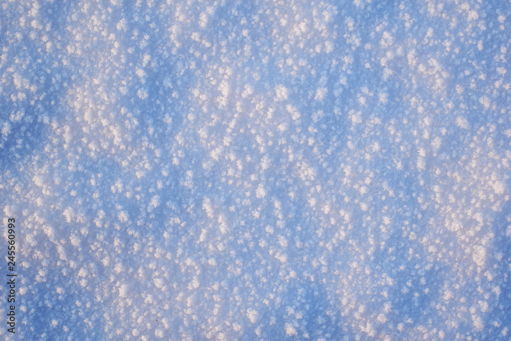 Abstraction of blue snow for a background. large snowflakes. concept winter natural background Abstraction of blue snow for a background. large snowflakes. concept winter natural background