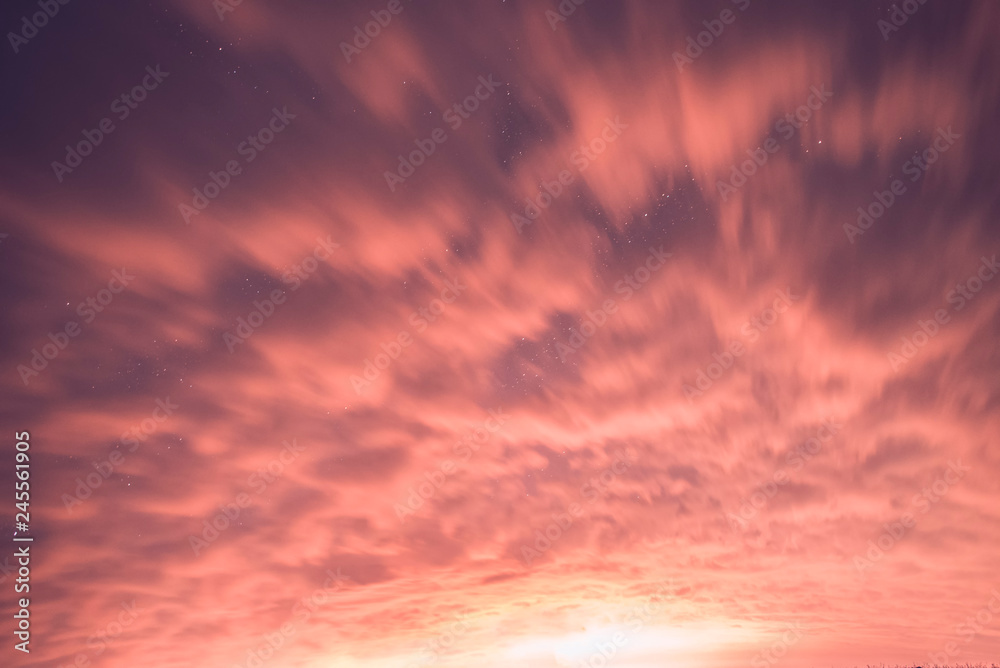 Colorful orange clouds on the sky.