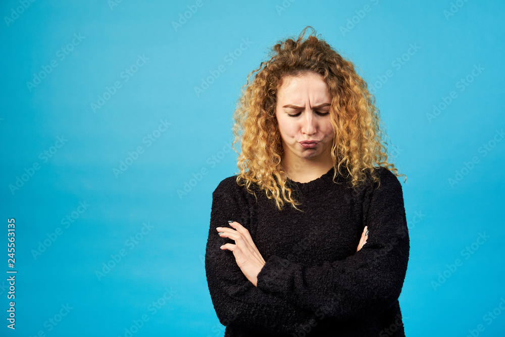 Young woman with disappointed expression. Young woman with disappointed expression.