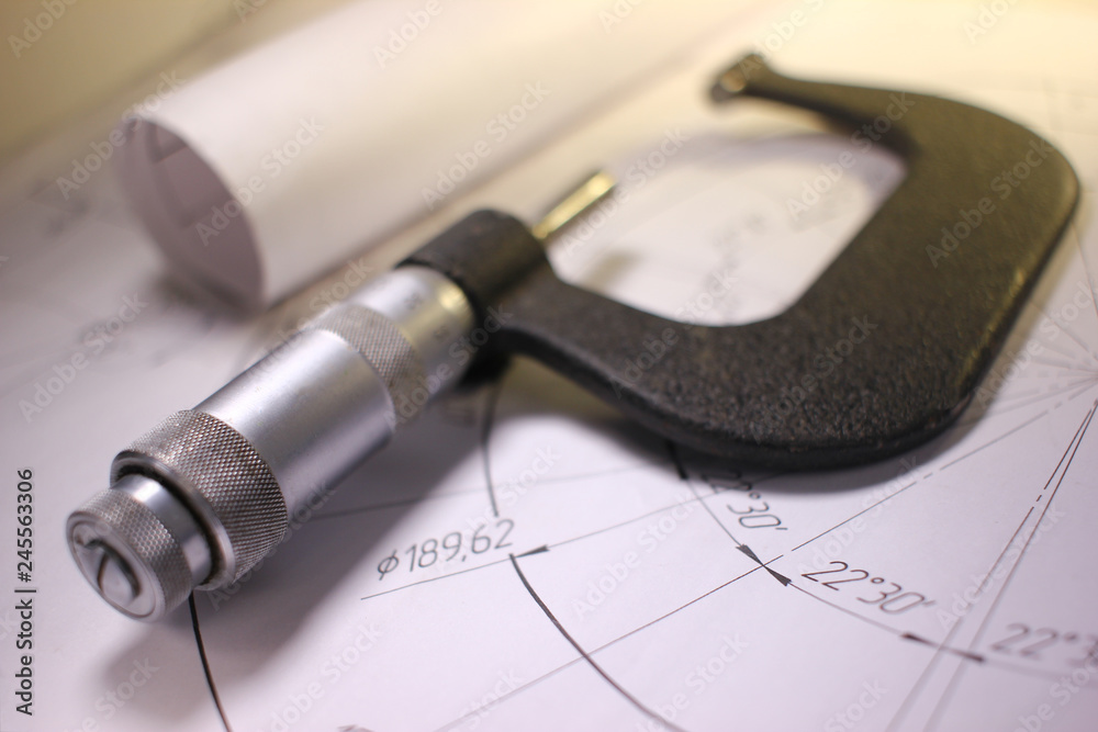 details after processing lies on the technical drawing, ready to work with the drawing in mechanical engineering, vignette details after processing lies on the technical drawing, ready to work with the drawing in mechanical engineering, vignette