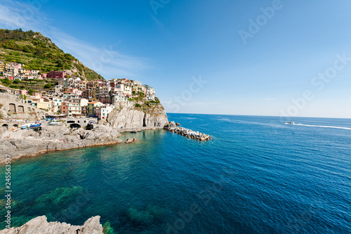 View of Manarola village in Cinque Terre. Manarola is a small town of Riomaggiore, in the province of La Spezia, Liguria, northern Italy. It is the second smallest town of the famous Cinque Terre town