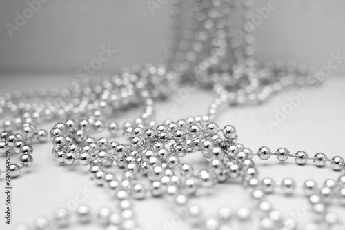 Silver beads on a white background