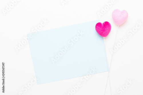 Red heart on the white wooden background.Valentines day greeting card.