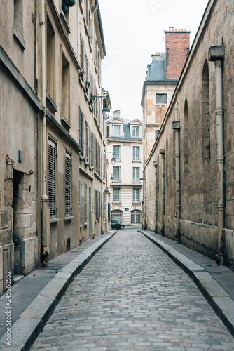 Fototapeta Naklejka Na Ścianę i Meble -  Rue Saint-Etienne du Mont, a narrow cobblestone street in the Latin Quarter (5th arrondissement), Paris, France