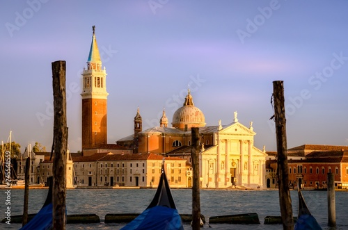 Gondolas moored by Saint Mark square with San Giorgio di Maggior © THANAN