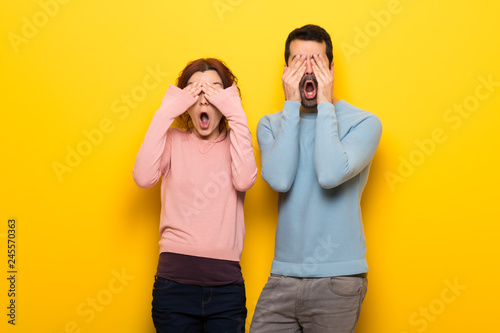 Couple in valentine day covering eyes by hands
