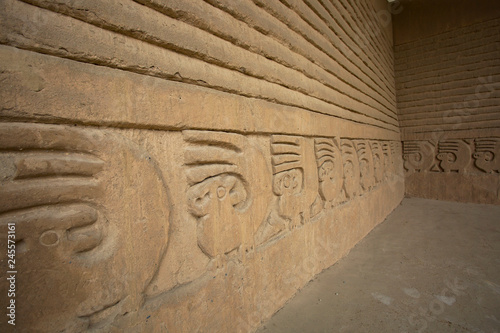 Ancient wall scupltures in Chan Chan ruines near Trujillo in Peru photo