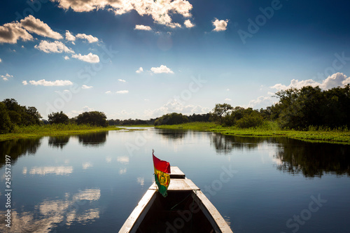 Travelling on a boat through the pampas near Rurrenabaque, Bolivia photo