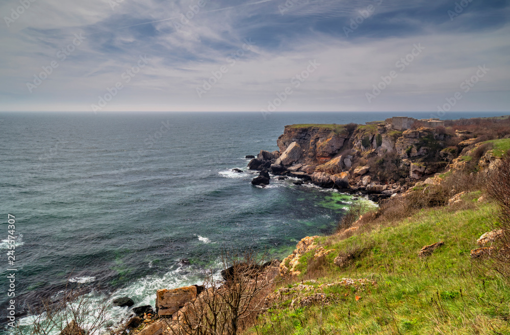 Beautiful landscape with blue sea and rocky shore Beautiful landscape with blue sea and rocky shore