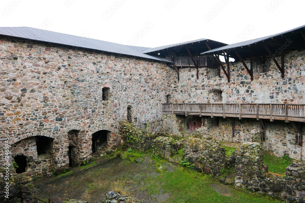 Medieval Raseborg castle courtyard with house ruins, Finland