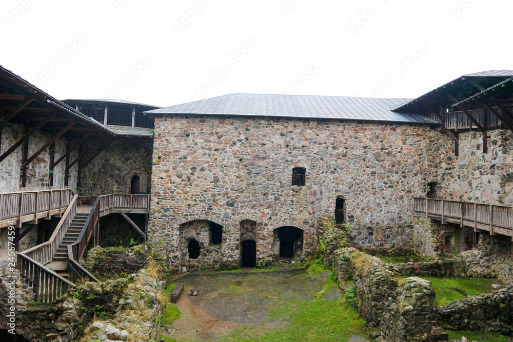 Medieval Raseborg castle courtyard with house ruins, Finland