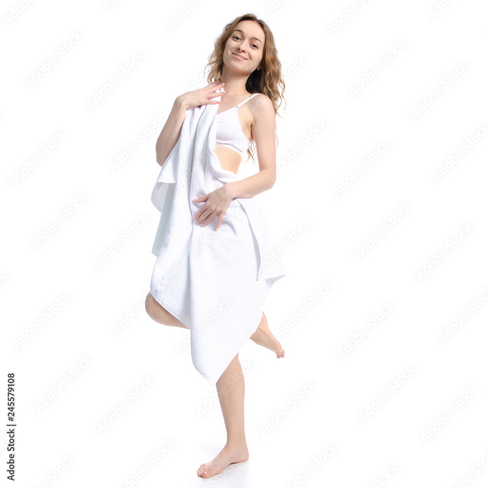Beautiful woman in white bra and panties towel in hand beauty body care on white background isolation Beautiful woman in white bra and panties towel in hand beauty body care on white background isolation