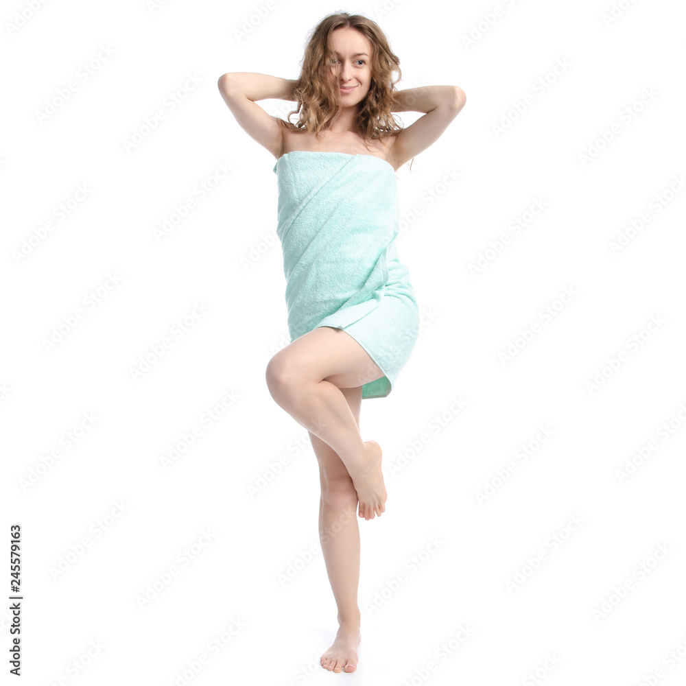 Beautiful woman in green towel beauty on white background isolation Beautiful woman in green towel beauty on white background isolation