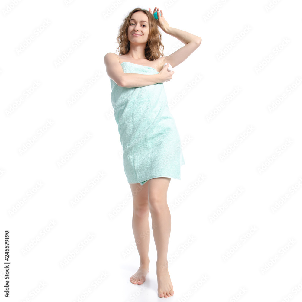 Beautiful woman in green towel roller antiperspirant in hand beauty body care on white background isolation