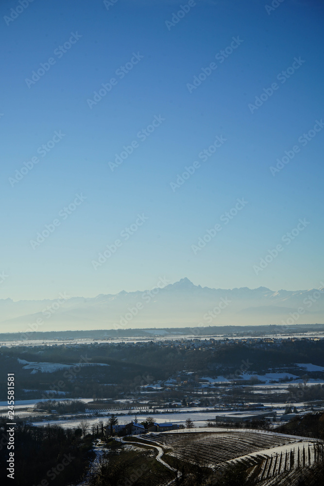 Langhe hills and Monviso during the winter , Piedmont - Italy