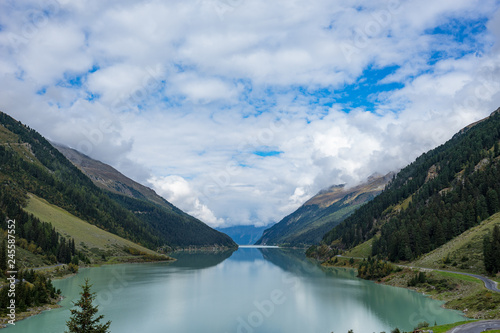 Mountains, peaks, lake, everlasting ice and trees landscape. Kaunertaler Gletscher natural environment. Hiking in the alps, Kaunertal, Tirol, Austria, Europe