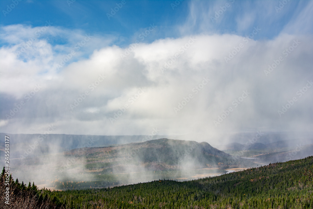 Mist in mountain river valley in Newfoundland, Canada