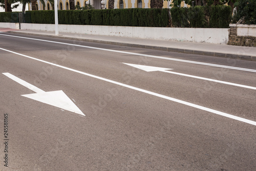 Wallpaper Mural Arrow signs as road markings on a street with two lanes Torontodigital.ca