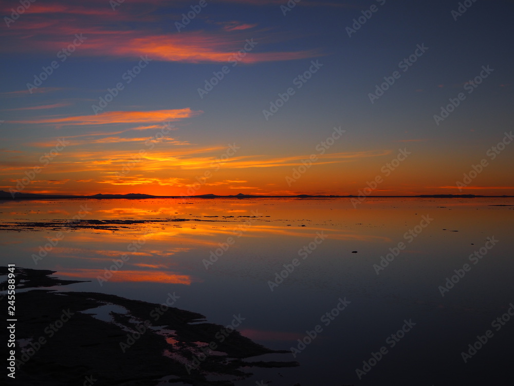 sunset over the Uyuni salar sunset over the Uyuni salar