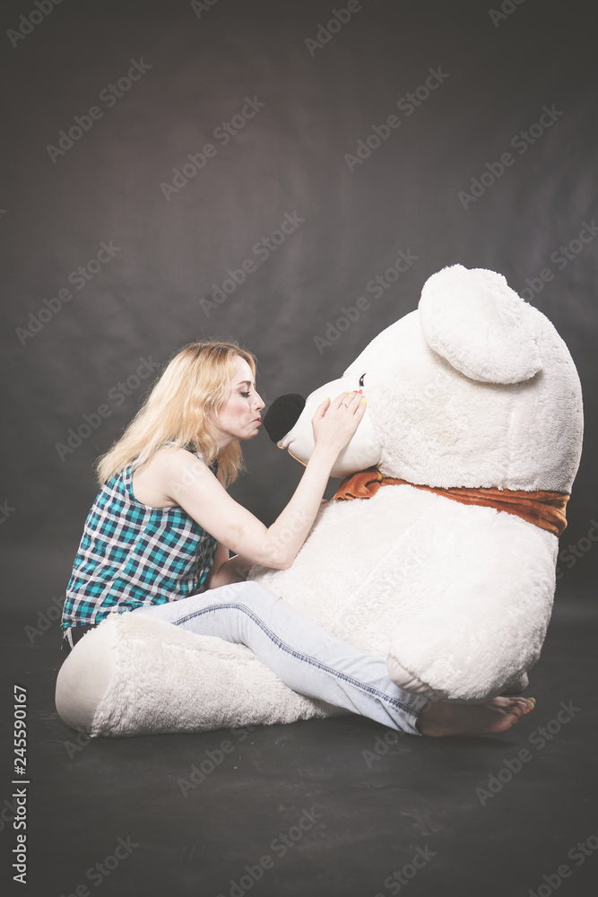 huge Teddy polar bear in yellow scarf 