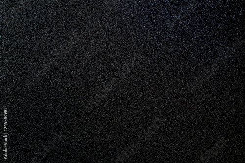 Texture black background with lots of bright little dots