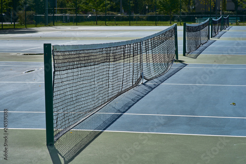 Wallpaper Mural Tennis net with bokeh nature in the background. Torontodigital.ca