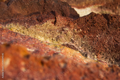 brown yellow red rock porous background for text