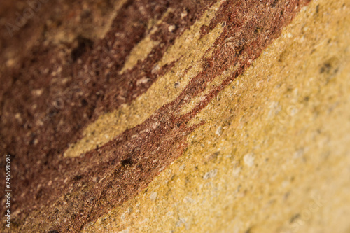 brown yellow stone background for text in focus